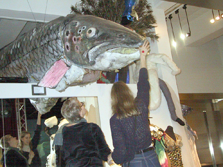 Riikka, Marjo and pig fish hanging from the roof